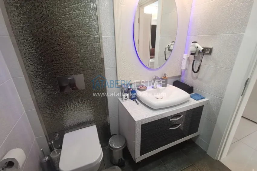 Приобрести Аренда квартиры в Алании, Махмутлар в престижном комплексе с частным пляжем А156  30 