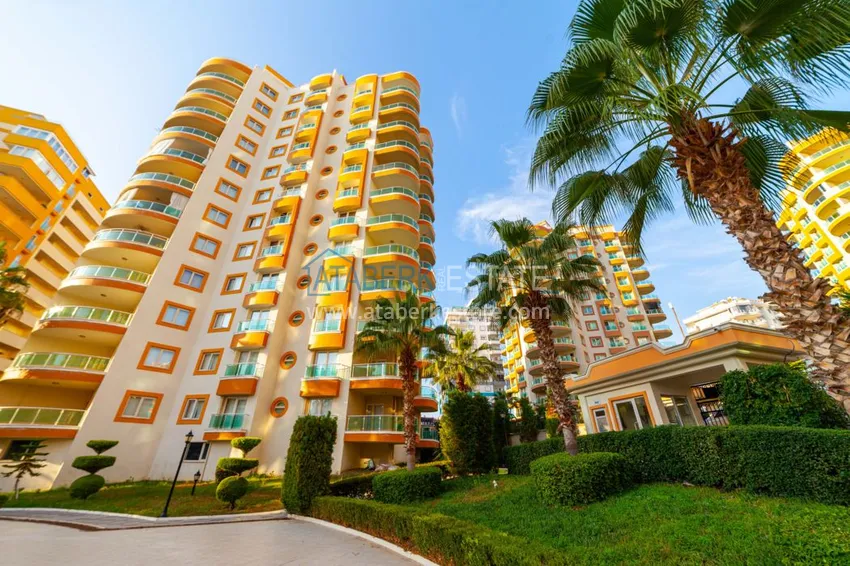 Квартира в Махмутларе двухкомнатная с частичным видом на море 1 