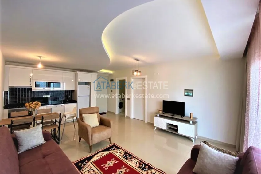 Приобрести Квартира в Махмутларе меблированная, в современном жилом комплексе 1 