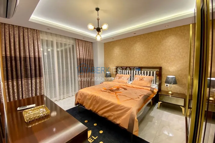 Приобрести Квартира в Махмутларе 2 спальни, отдельная кухня 10 