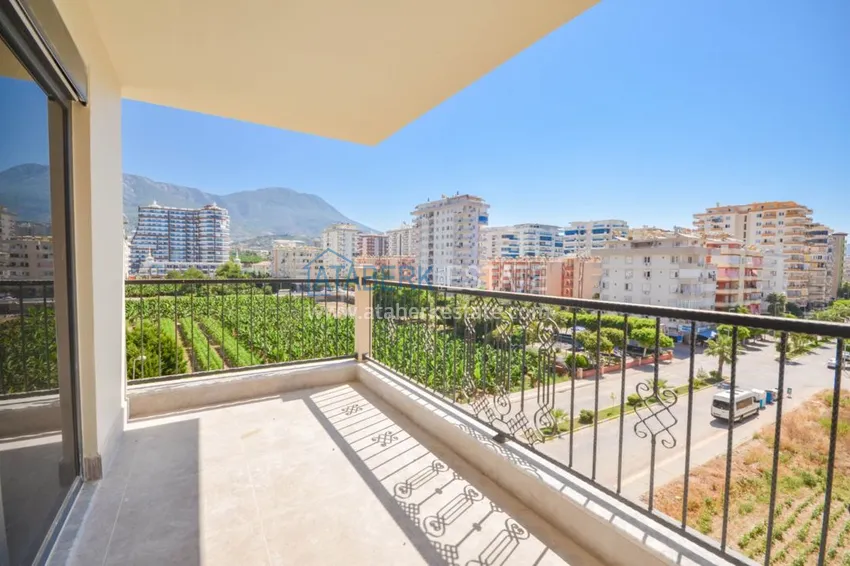 Приобрести Новостройки Алании – квартира в центре Махмутлара, с чистовой отделкой 10 