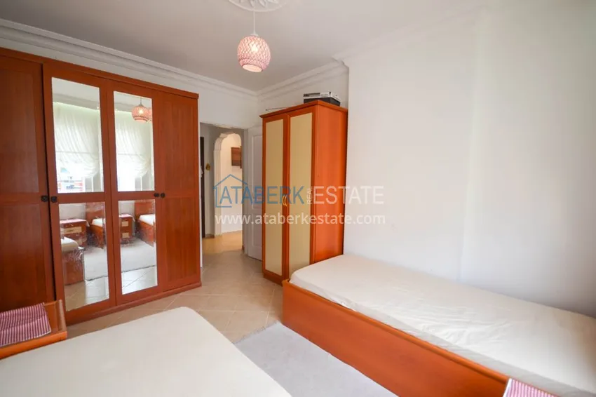 Приобрести Трехкомнатные апартаменты с мебелью в центре курортного городка в Махмутларе 10 