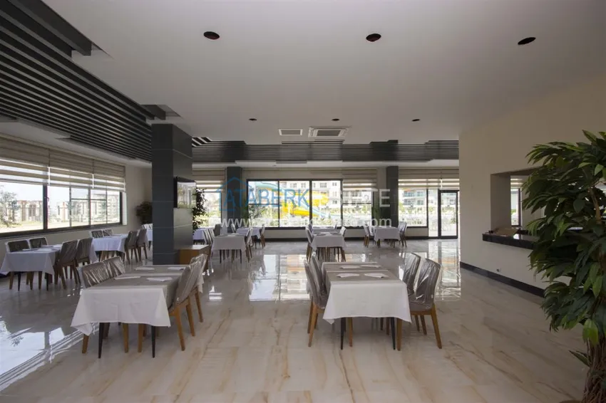 Квартира в Авсалларе, меблированная с видом на море в комплексе с частным пляжем 11 