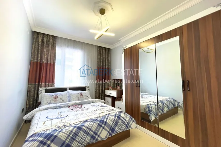 Приобрести Квартира в Махмутларе уютная с отдельной кухней, мебелью 12 