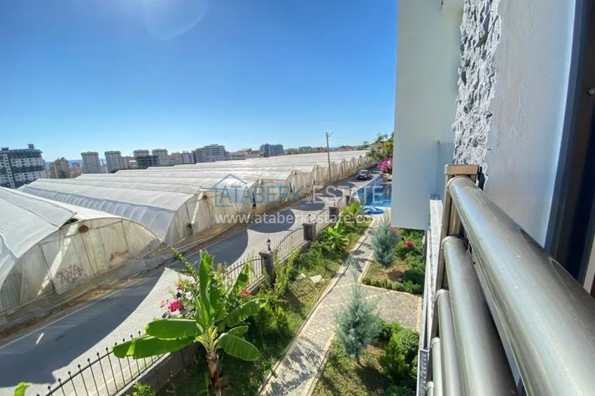 Приобрести Квартира в Махмутларе с новой мебелью в комплексе с бассейном  11 