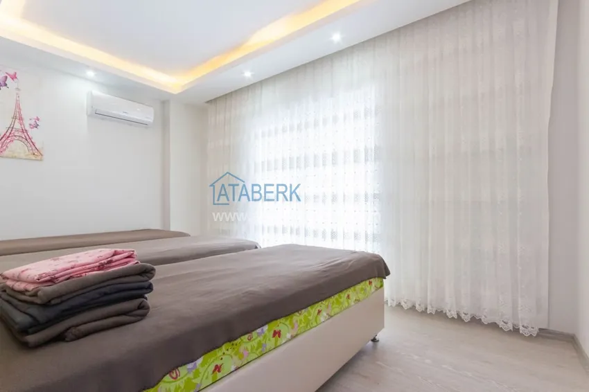 Приобрести Квартира в Махмутларе трехкомнатная, с мебелью в комфортабельном комплексе 10 