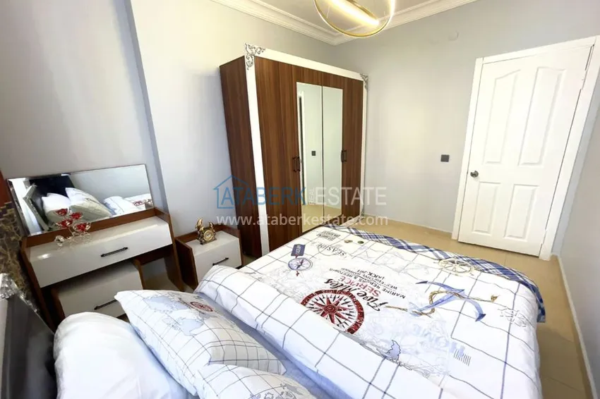 Приобрести Квартира в Махмутларе уютная с отдельной кухней, мебелью 13 