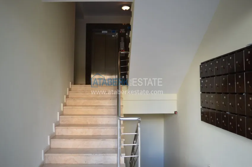 Квартира в Махмутларе двухкомнатная с частичным видом на море 20 