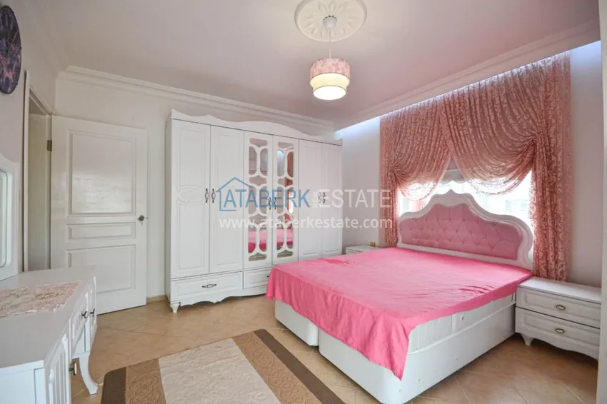 Приобрести Трехкомнатные апартаменты с мебелью в центре курортного городка в Махмутларе 11 