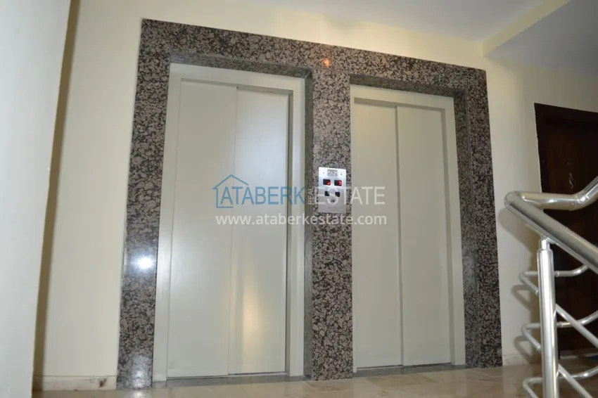 Квартира в Махмутларе двухкомнатная с частичным видом на море 21 