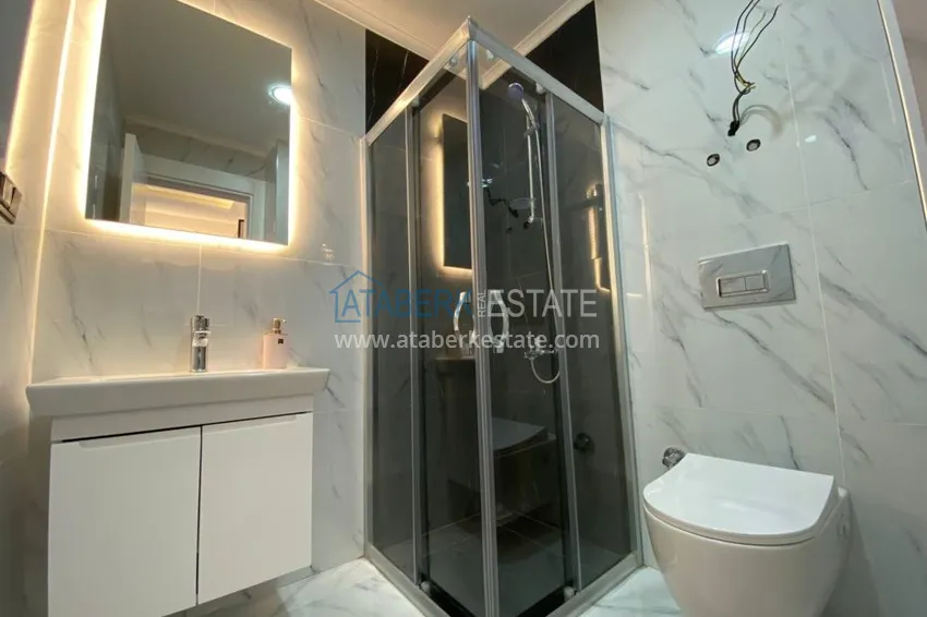 Приобрести Новые квартиры в Каргыджаке с современным интерьером и видом на море  10 