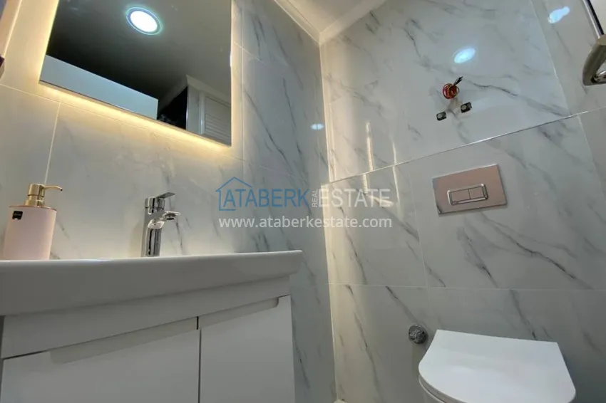 Приобрести Новые квартиры в Каргыджаке с современным интерьером и видом на море  11 