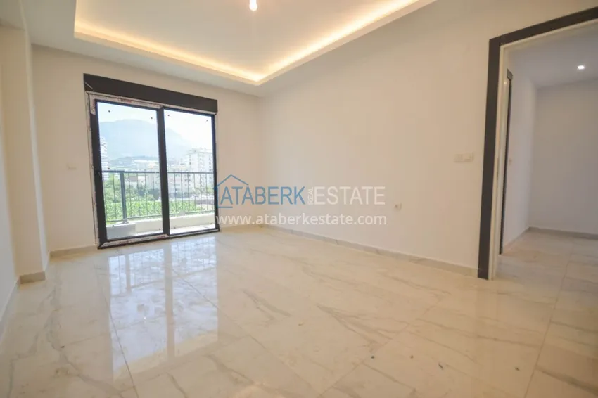 Приобрести Новостройки Алании – квартира в центре Махмутлара, с чистовой отделкой 12 