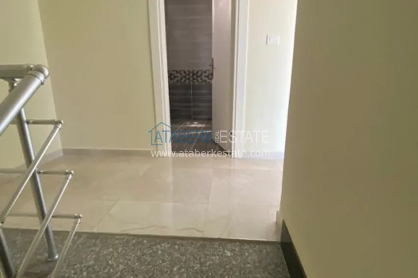 Приобрести Дуплекс в Махмутларе в благоустроенном комплексе рядом с морем 12 