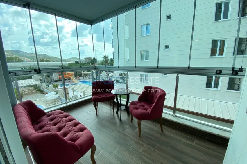 Приобрести Квартира в Махмутларе меблированная, в молодом современном комплексе 12 