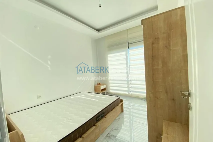 Приобрести Квартира в Махмутларе с новой мебелью в комплексе с бассейном  13 