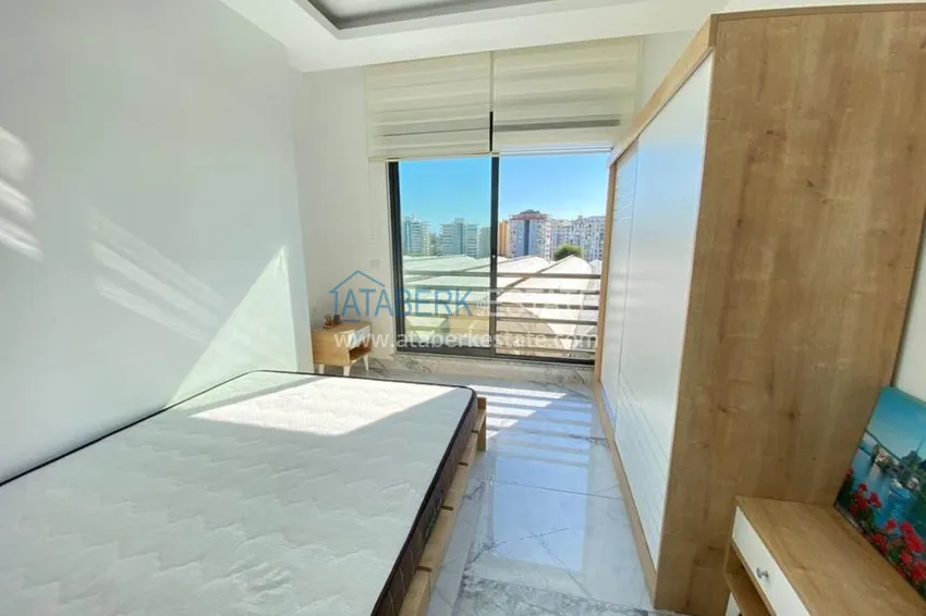 Приобрести Квартира в Махмутларе с новой мебелью в комплексе с бассейном  14 