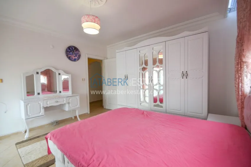 Приобрести Трехкомнатные апартаменты с мебелью в центре курортного городка в Махмутларе 13 