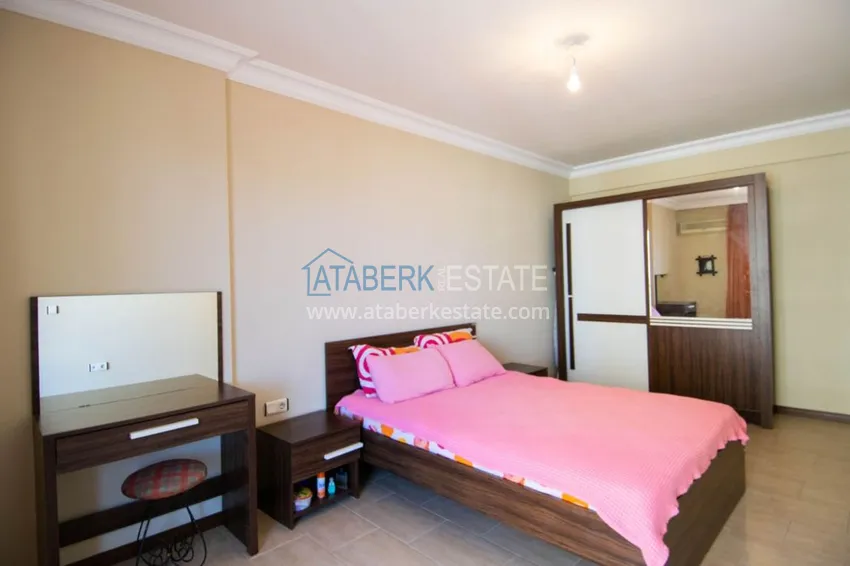 Приобрести Квартира с открытым видом на море в Махмутларе с мебелью в комплексе на первой береговой линии  12 