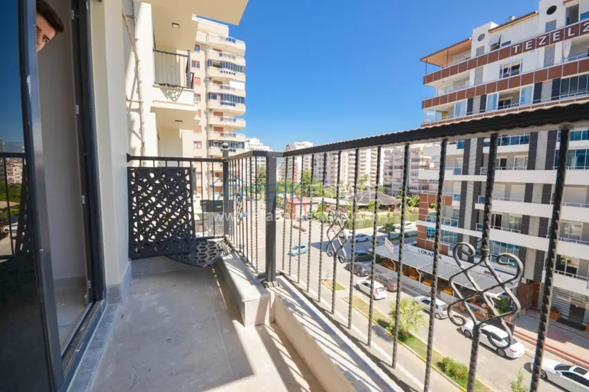 Приобрести Новостройки Алании – квартира в центре Махмутлара, с чистовой отделкой 14 