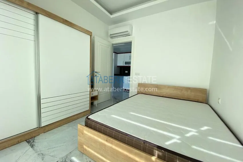 Приобрести Квартира в Махмутларе с новой мебелью в комплексе с бассейном  15 