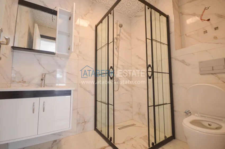 Приобрести Новостройки Алании – квартира в центре Махмутлара, с чистовой отделкой 17 