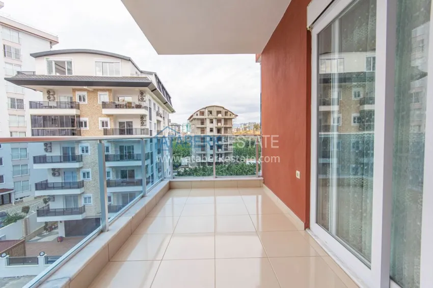 Приобрести Квартира в Махмутларе трехкомнатная, с мебелью в комфортабельном комплексе 15 