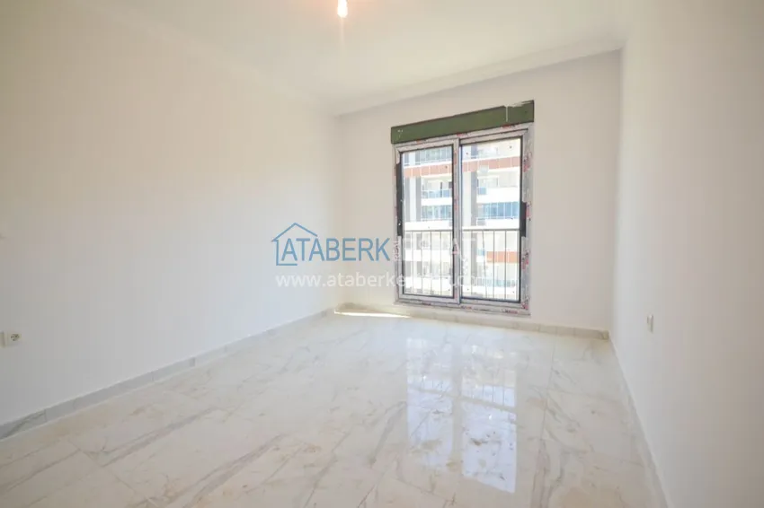 Приобрести Новостройки Алании – квартира в центре Махмутлара, с чистовой отделкой 18 