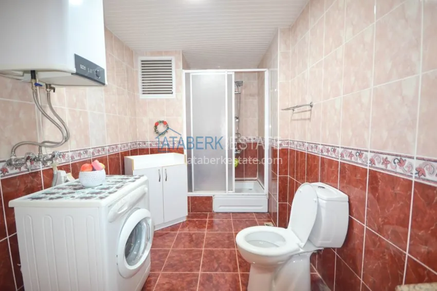 Приобрести Трехкомнатные апартаменты с мебелью в центре курортного городка в Махмутларе 15 