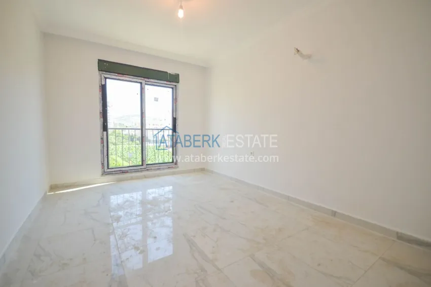 Приобрести Новостройки Алании – квартира в центре Махмутлара, с чистовой отделкой 19 