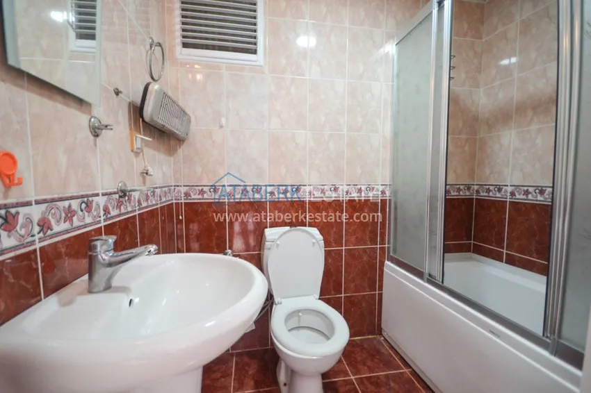 Приобрести Трехкомнатные апартаменты с мебелью в центре курортного городка в Махмутларе 16 