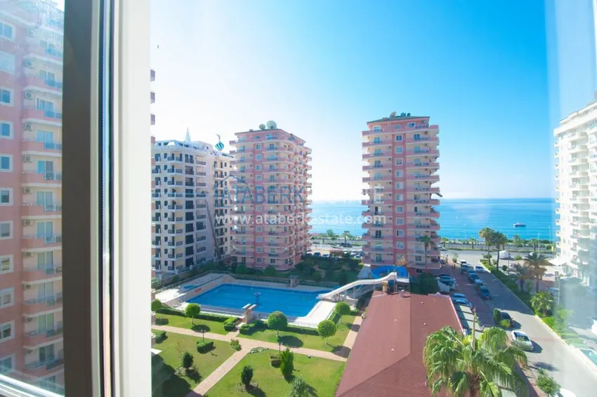 Приобрести Квартира с открытым видом на море в Махмутларе с мебелью в комплексе на первой береговой линии  16 