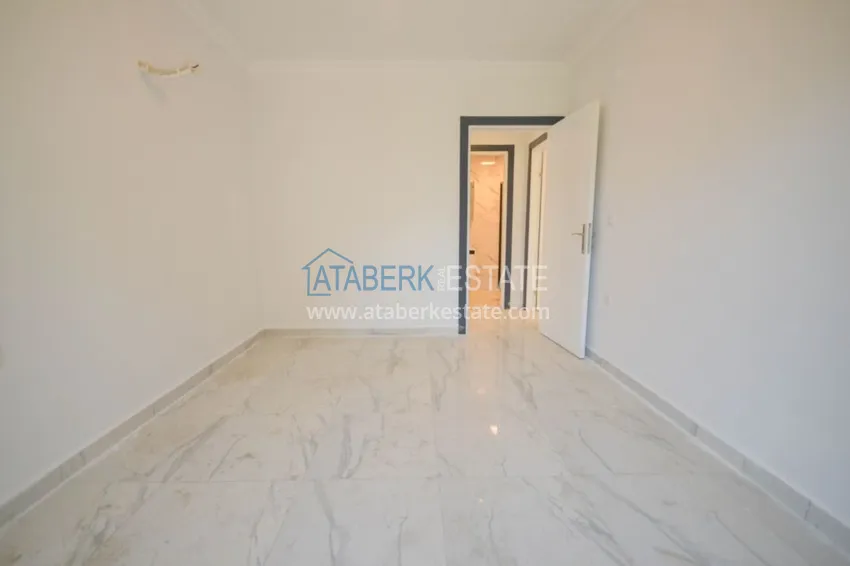 Приобрести Новостройки Алании – квартира в центре Махмутлара, с чистовой отделкой 20 