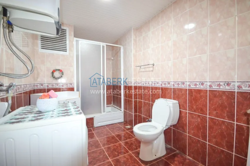 Приобрести Трехкомнатные апартаменты с мебелью в центре курортного городка в Махмутларе 17 