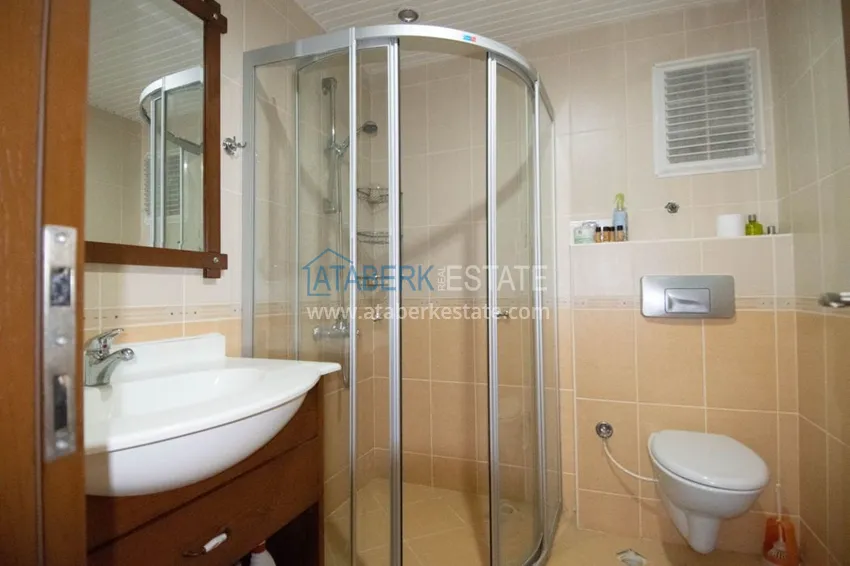 Приобрести Квартира с открытым видом на море в Махмутларе с мебелью в комплексе на первой береговой линии  17 