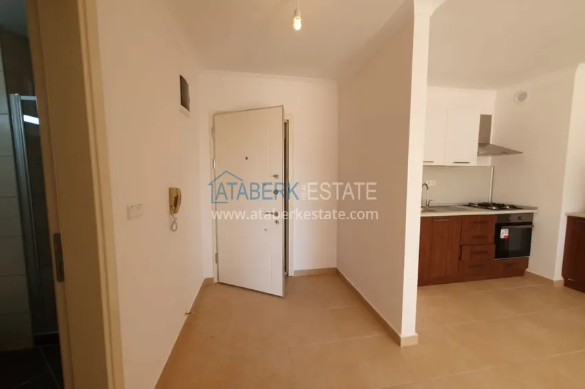 Приобрести Квартира в Махмутларе двухкомнатная с частичным видом на море 1 