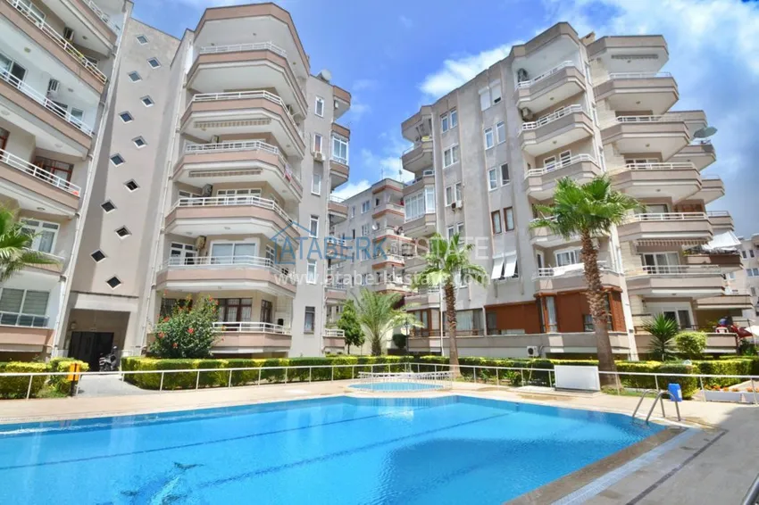 Квартира в Махмутларе трехкомнатная с мебелью, отдельной кухней и видом на море 1 