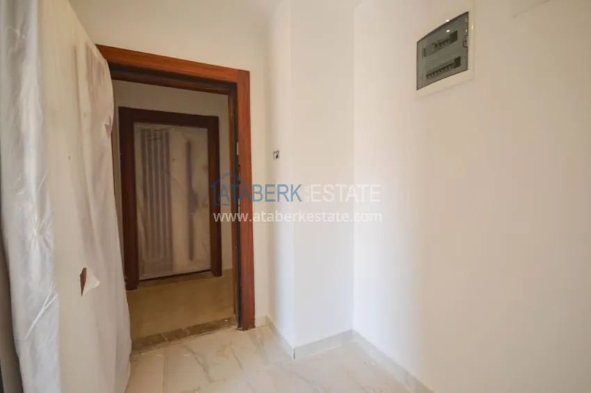 Приобрести Новостройки Алании – квартира в центре Махмутлара, с чистовой отделкой 1 