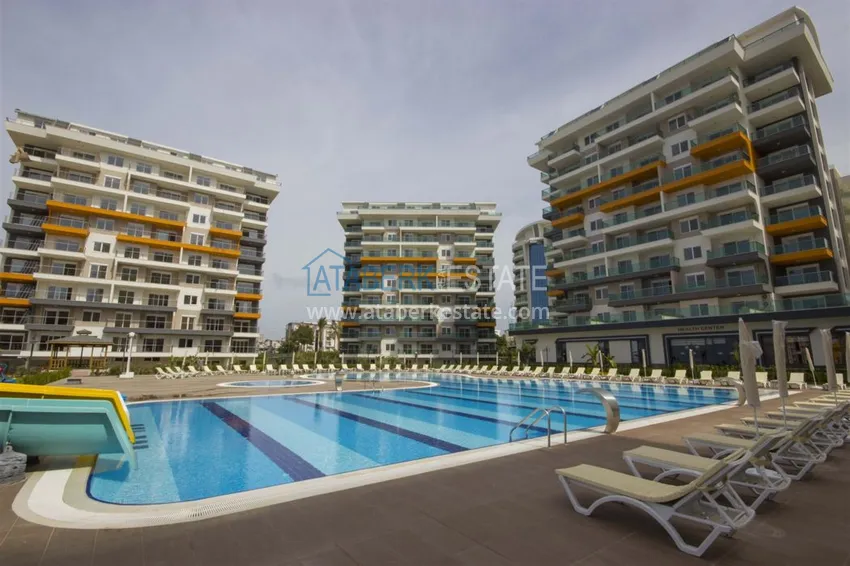 Квартира в Авсалларе, меблированная с видом на море в комплексе с частным пляжем 1 