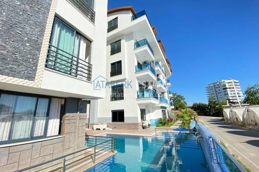 Квартира в Махмутларе с новой мебелью в комплексе с бассейном  1 