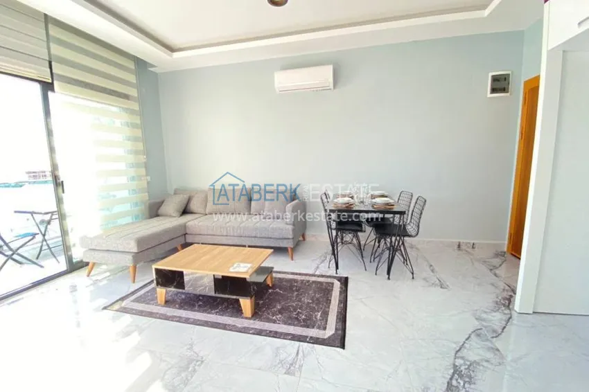 Приобрести Квартира в Махмутларе с новой мебелью в комплексе с бассейном  2 