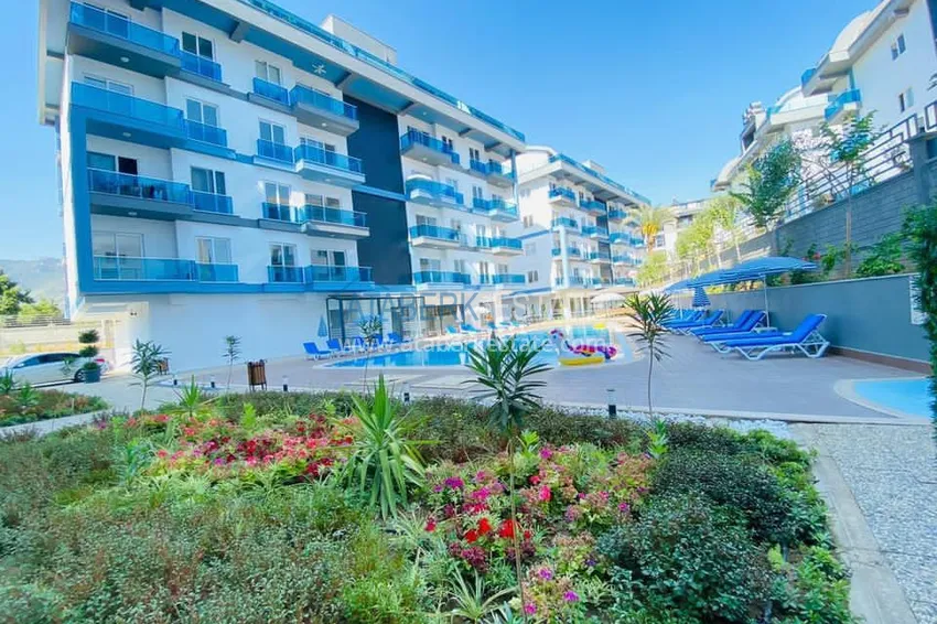 Квартира в районе Оба с чистовой отделкой, в молодом современном комплексе 1 