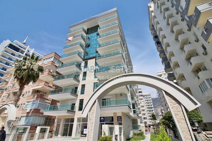 Квартира в Махмутларе – двухкомнатная, новая мебель, вид на горы 1 