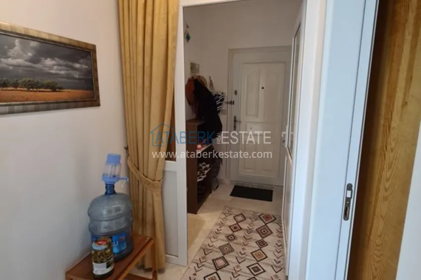 Приобрести Двухкомнатная квартира в районе Авсаллар с видом на море, балкон застеклен 1 