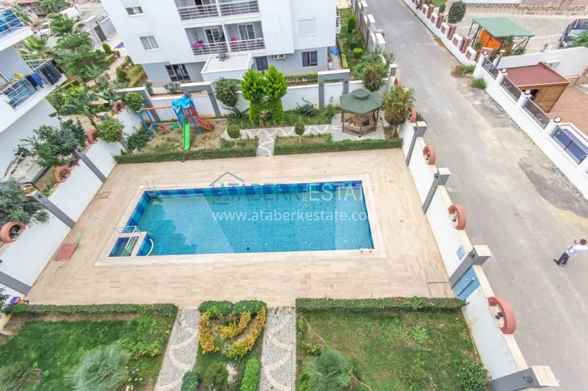 Приобрести Квартира в Махмутларе трехкомнатная, с мебелью в комфортабельном комплексе 21 