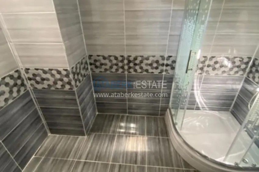 Приобрести Дуплекс в Махмутларе в благоустроенном комплексе рядом с морем 21 