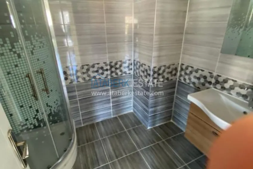 Приобрести Дуплекс в Махмутларе в благоустроенном комплексе рядом с морем 22 