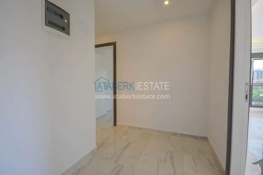 Приобрести Новостройки Алании – квартира в центре Махмутлара, с чистовой отделкой 2 