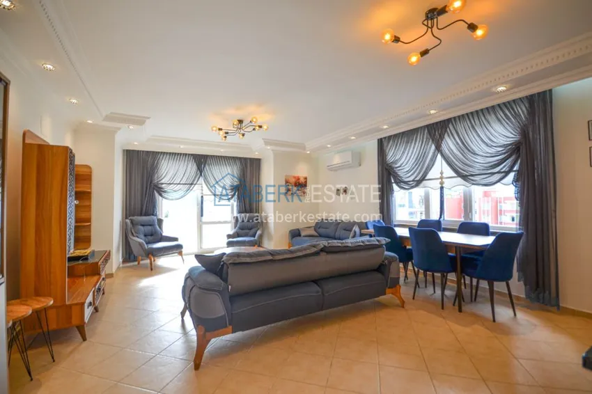 Приобрести Трехкомнатные апартаменты с мебелью в центре курортного городка в Махмутларе 2 