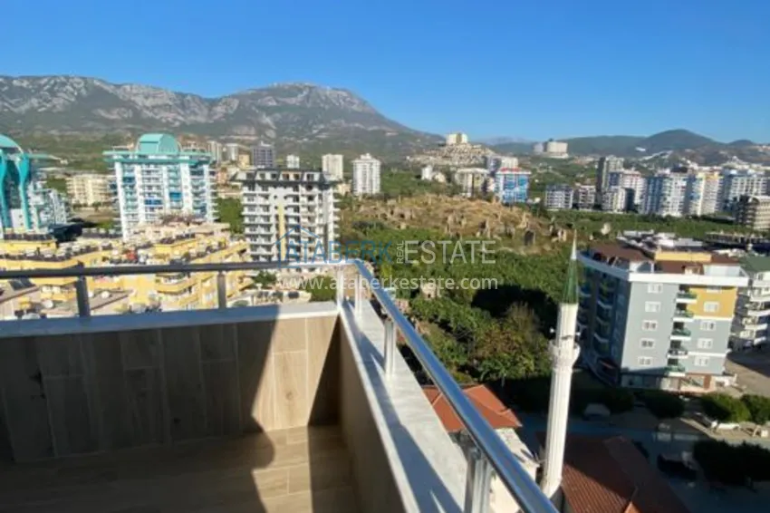 Приобрести Дуплекс в Махмутларе в благоустроенном комплексе рядом с морем 30 